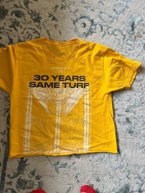 tde. Yellow '30 Years Same Turf' Graphic Tee